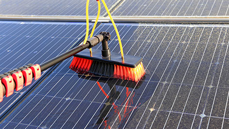 Water fed pole used to clean large solar panel arrays